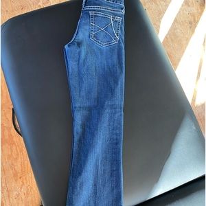 Girls size 16 Ariat jeans. Excellent condition. Fit nice.